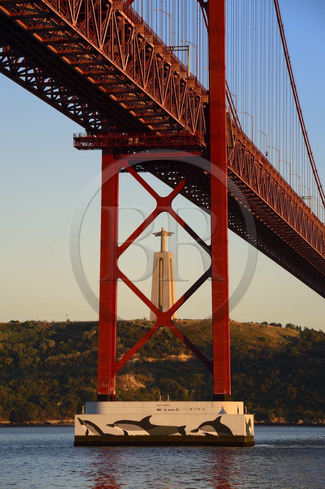 Portugal, Lisbon, 25 de Abril bridge on Tagus river and the Cristo Rei (Christ the King)