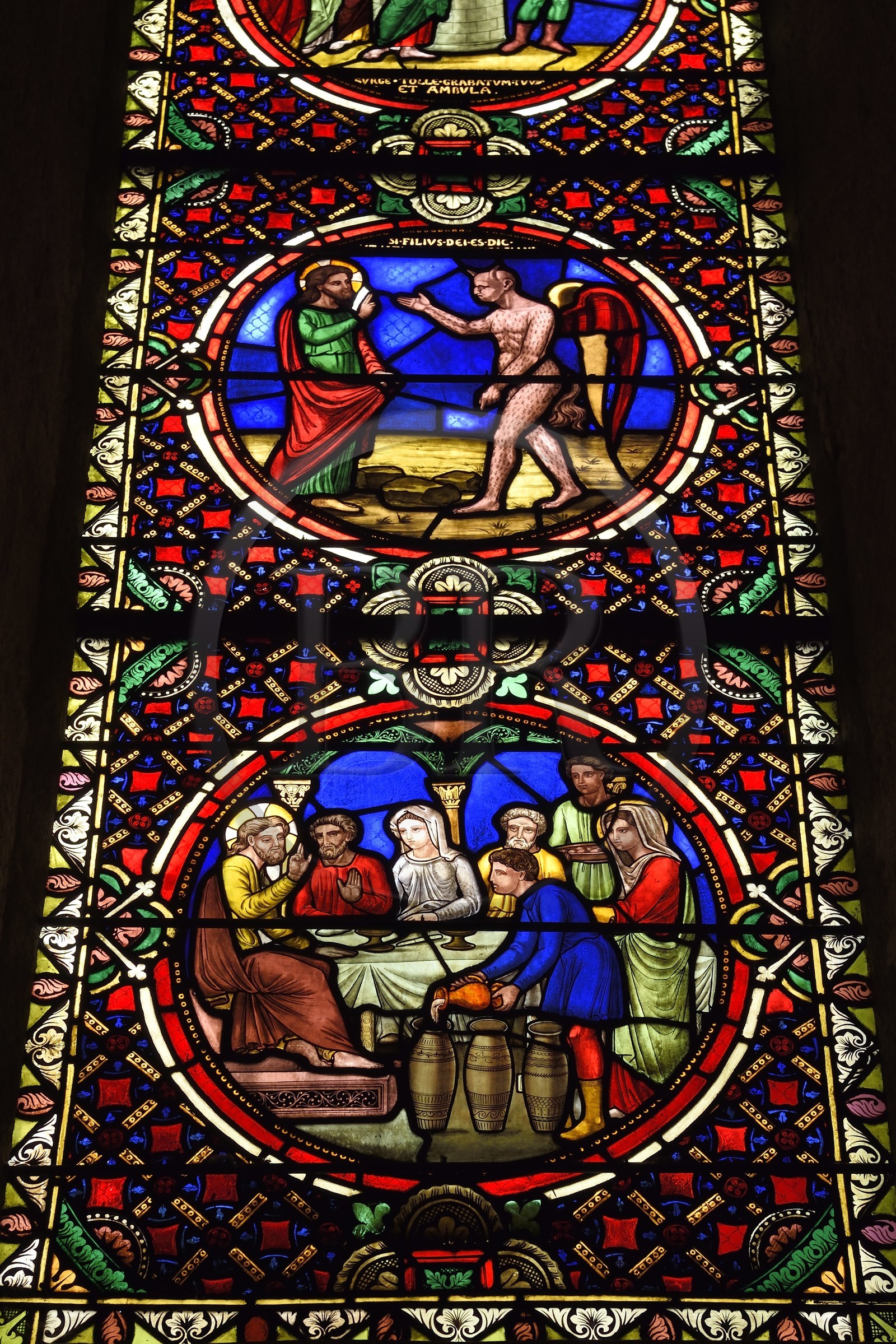 France, Puy de Dome, Clermont Ferrand, Notre-Dame-du-Port basilica in Auvergne Romanesque style, listed as a UNESCO World Heritage Site under the Routes of Saint-Jacques-de-Compostelle in France, vitrail du XIXe siècle réalisé par Étienne Thévenot qui présente à la manière médiévale des scènes bibliques issues du Nouveau Testament