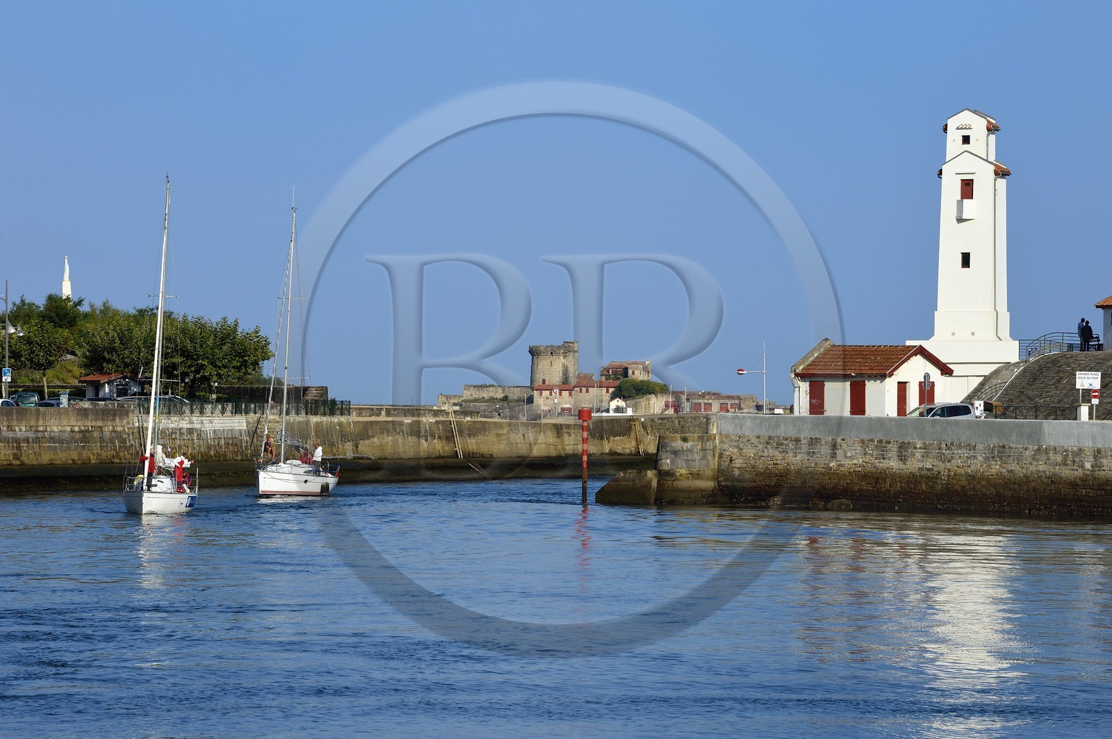 France, Pyrenees Atlantiques, Basque Country, Saint Jean de Luz, the fishing port, the harbor lighthouse built by André Pavlovsky and classified as a historical monument at the port entrance