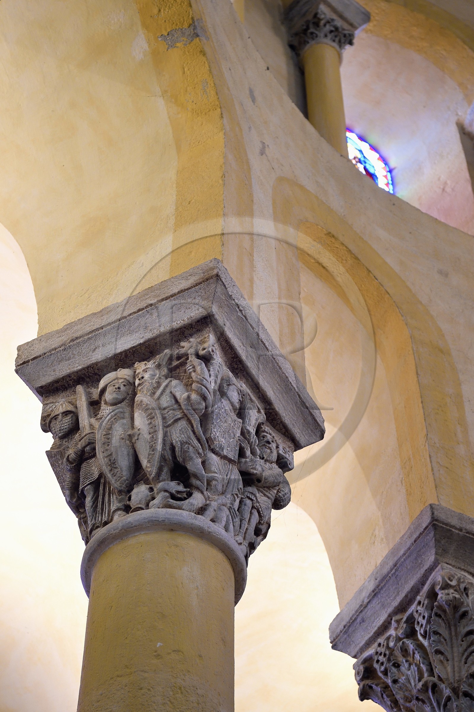 France, Puy de Dome, Clermont Ferrand, Notre-Dame-du-Port basilica in Auvergne Romanesque style, listed as a UNESCO World Heritage Site under the Routes of Saint-Jacques-de-Compostelle in France, choir capital representing the battle of charity against greed