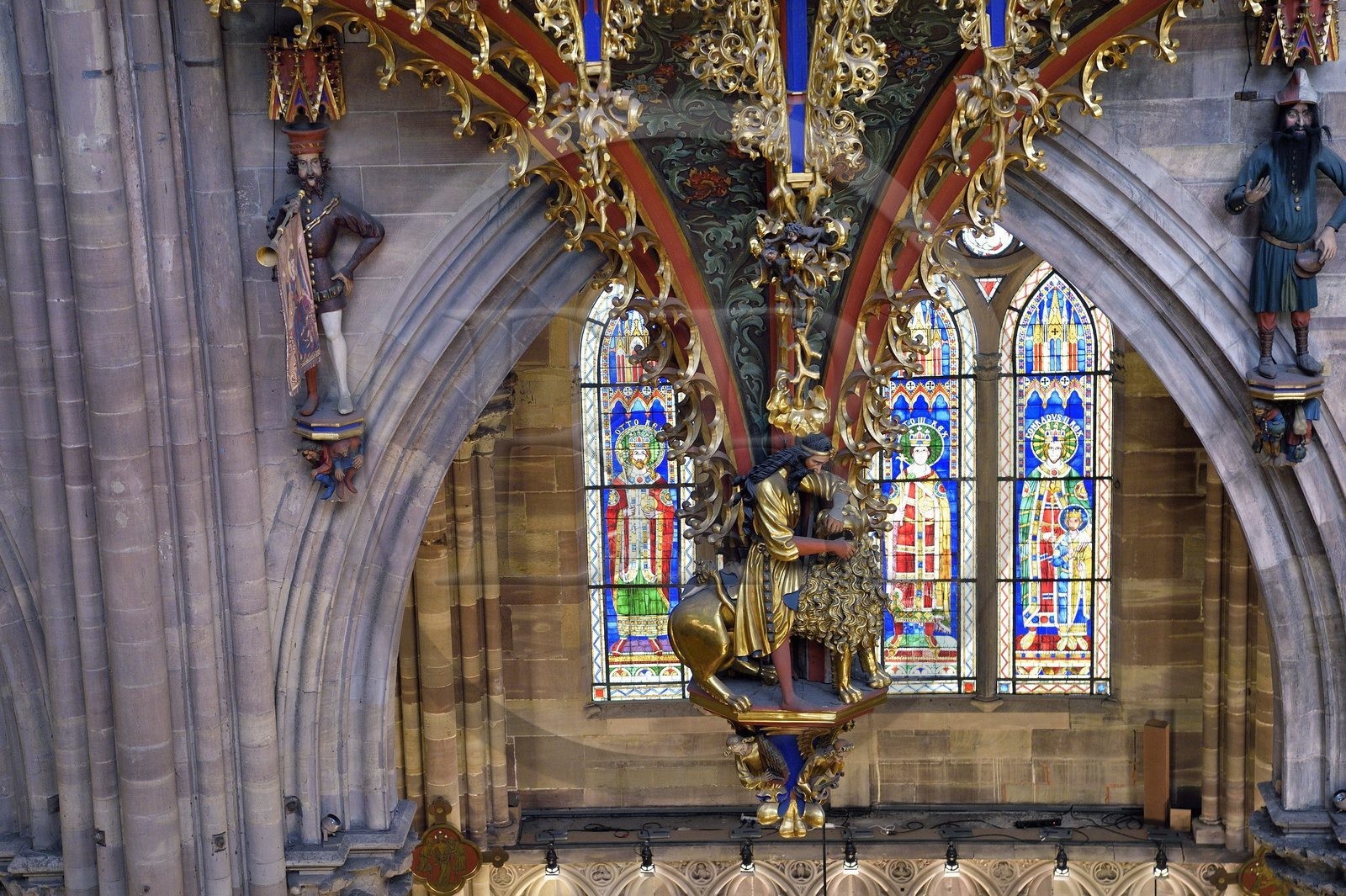 France, Bas Rhin, Strasbourg, old town listed as World Heritage by UNESCO, Notre Dame Cathedral, the great organ overlooking the nave, the automaton called the Rohraffe (also Bretzelmann) on the right under the great organ, from there the faithful and the clergy were insulted during the services of the festivals of Pentecost, on the left a herald brings a trumpet to his mouth with the help of cables drawn by the organist