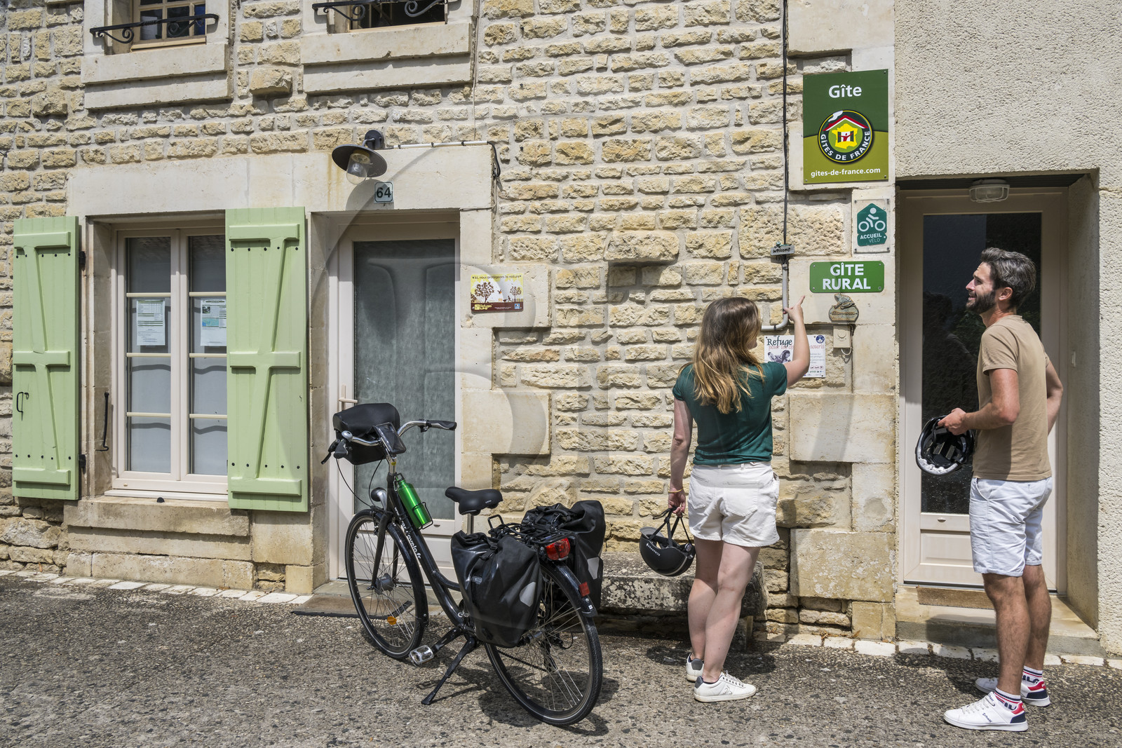 France, Deux-Sèvres, le Marais Poitevin, Green Venice, Sansais, B&B in the village displaying the Accueil Vélo logo