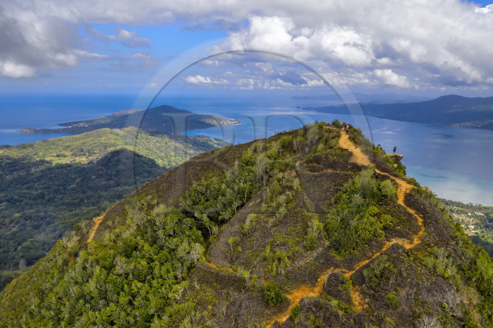 France, Mayotte island (French overseas department), Grande-Terre, Southern Crete Forest Reserve (Reserve Forestiere des Cretes du Sud), hikers at the summit of Mount Choungui (594 meters) and the Bay of Bouéni in the background (aerial view)