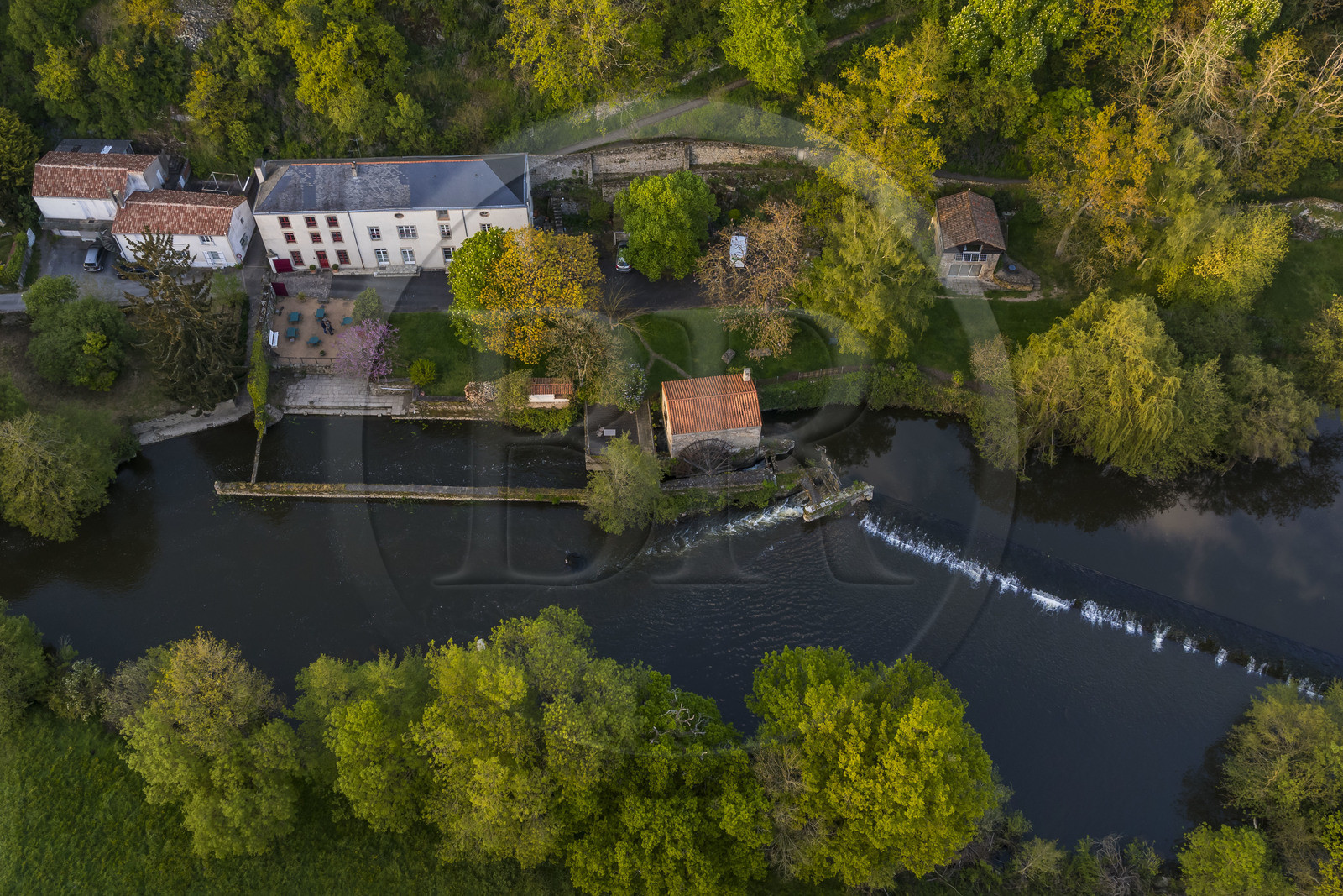 France, Vendee, Mortagne sur Sèvre, Moulin Pont Vieux guest house, a former spinning mill in the Sevre Nantaise river valley (aerial view)