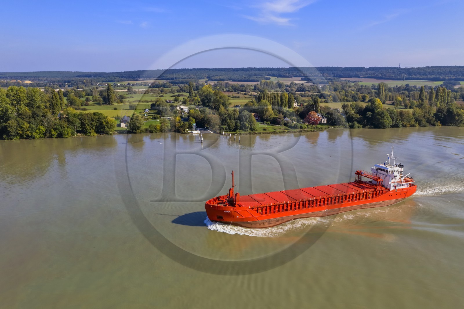 France, Seine-Maritime, Pays de Caux, Norman Seine River Meanders Regional Nature Park, the general cargo ship Merit going up the Seine at Mesnil sous Jumieges (aerial view)