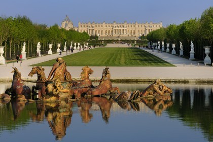 France, Yvelines, park of the Chateau de Versailles, listed as World Heritage by UNESCO, Apollo Basin by Tuby with the Apollo's Cart and Axe du Soleil (the Sun Axis) to the castle
