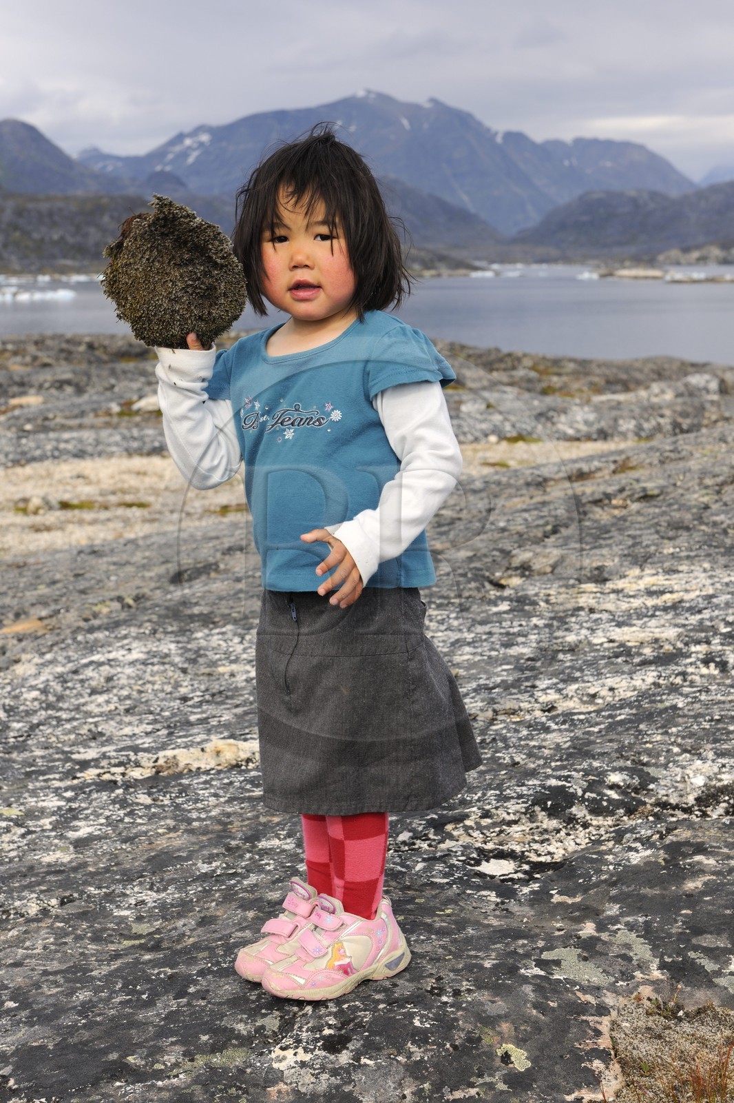 Greenland, Nanortalik, Inuit child playing