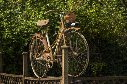 France, Maine-et-Loire, Loire valley listed as World Heritage by UNESCO, Gennes-Val-de-Loire, old bicycle as decoration