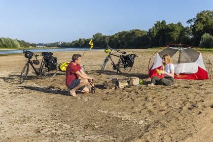 France, Maine-et-Loire, Loire valley listed as World Heritage by UNESCO, Saumur towards Saint-Hilaire, cycling along the banks of the Loire, camping for the night on one of the sandbanks forming islands on the Loire