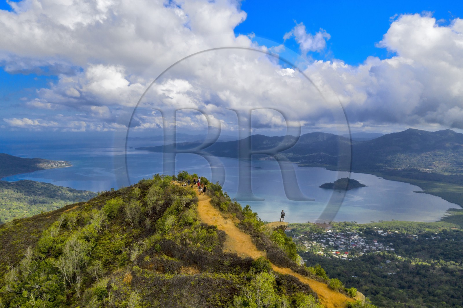 France, Mayotte island (French overseas department), Grande-Terre, Southern Crete Forest Reserve (Reserve Forestiere des Cretes du Sud), hikers at the summit of Mount Choungui (594 meters) and the Bay of Bouéni in the background (aerial view)