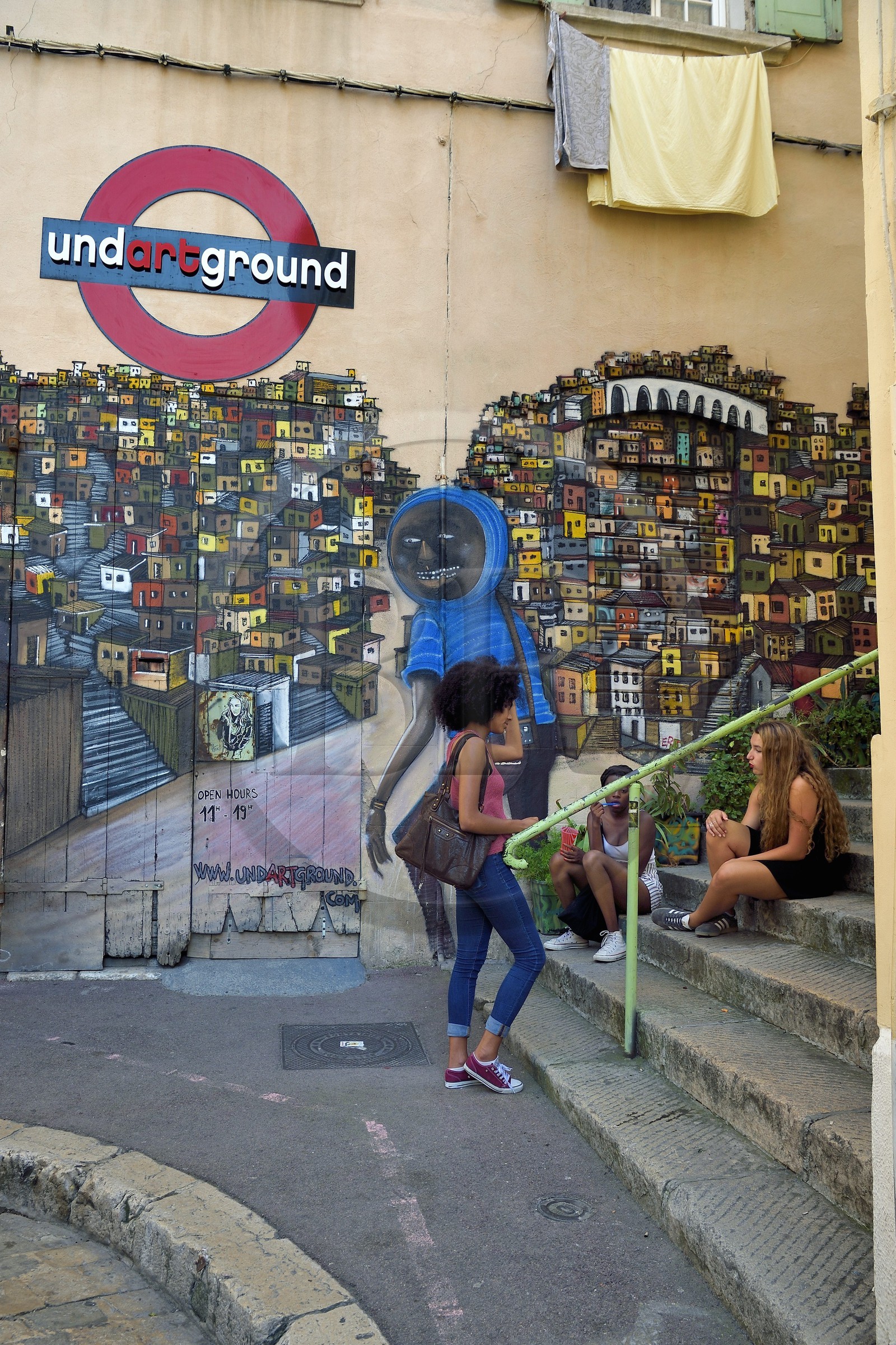 France, Bouches du Rhone, Marseille, Panier district, rue Sainte-Francoise, graffiti from the Undartground concept store surrounded by stairs, work of street Brazilian artist Nhobi