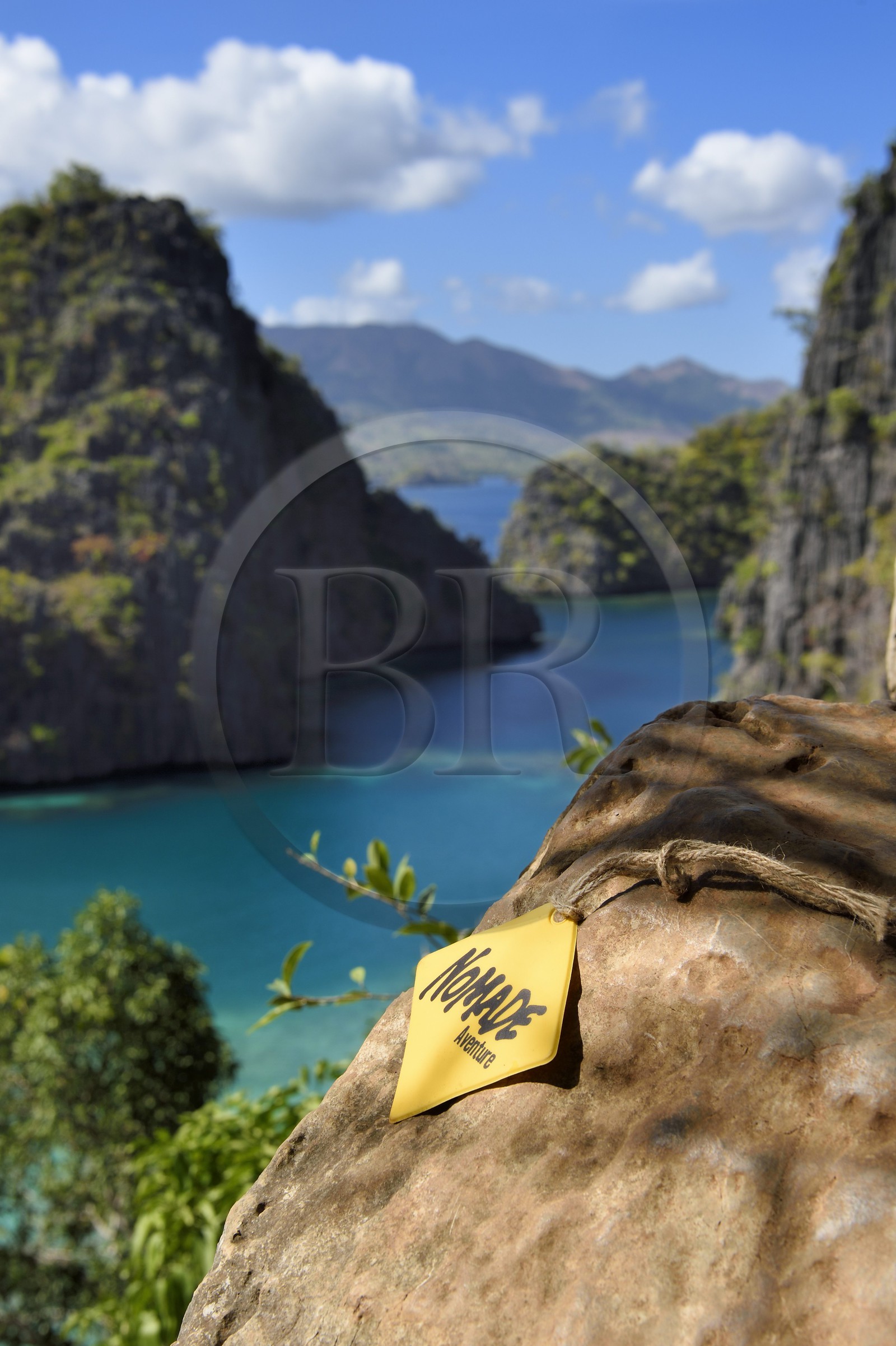 Philippines, Calamian Islands in northern Palawan, Coron Island Natural Biotic Area, lagoon on the way to Kayangan Lake, steep cliffs and Karst rock formations made of Permian limestone