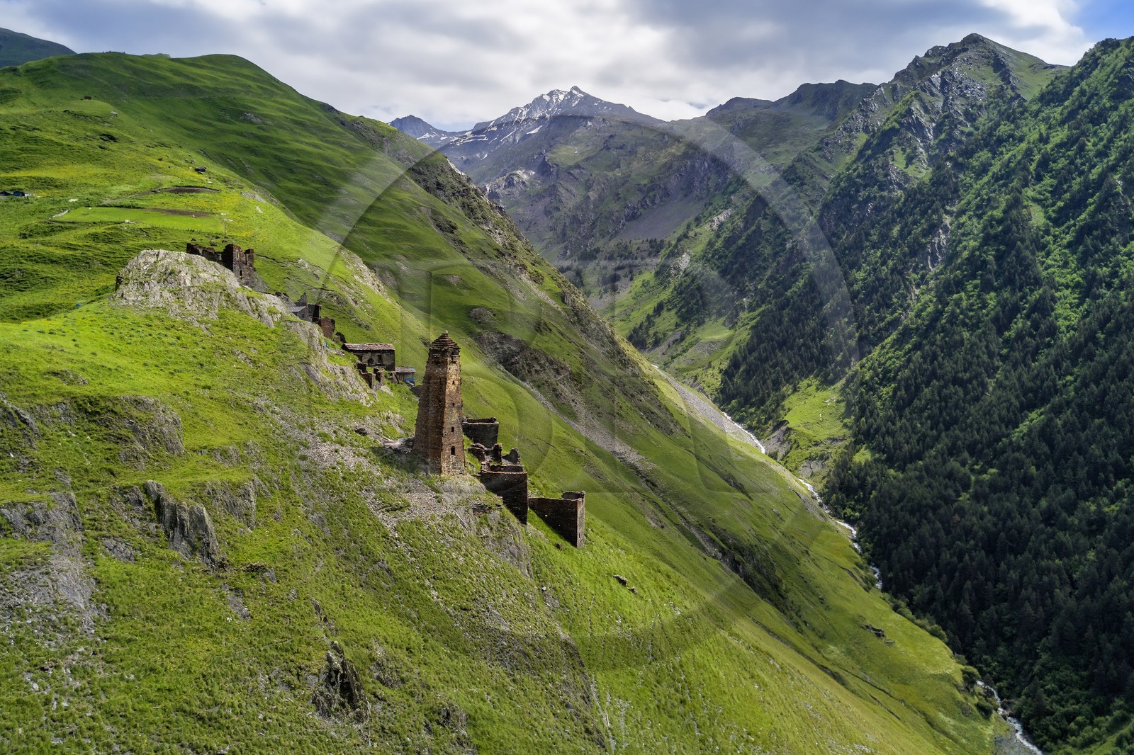 Georgia, Kakheti, Tusheti National Park, Alazani River Valley in the mountains of Pirikiti, hilltop village of Kvavlo over Dartlo (aerial view).