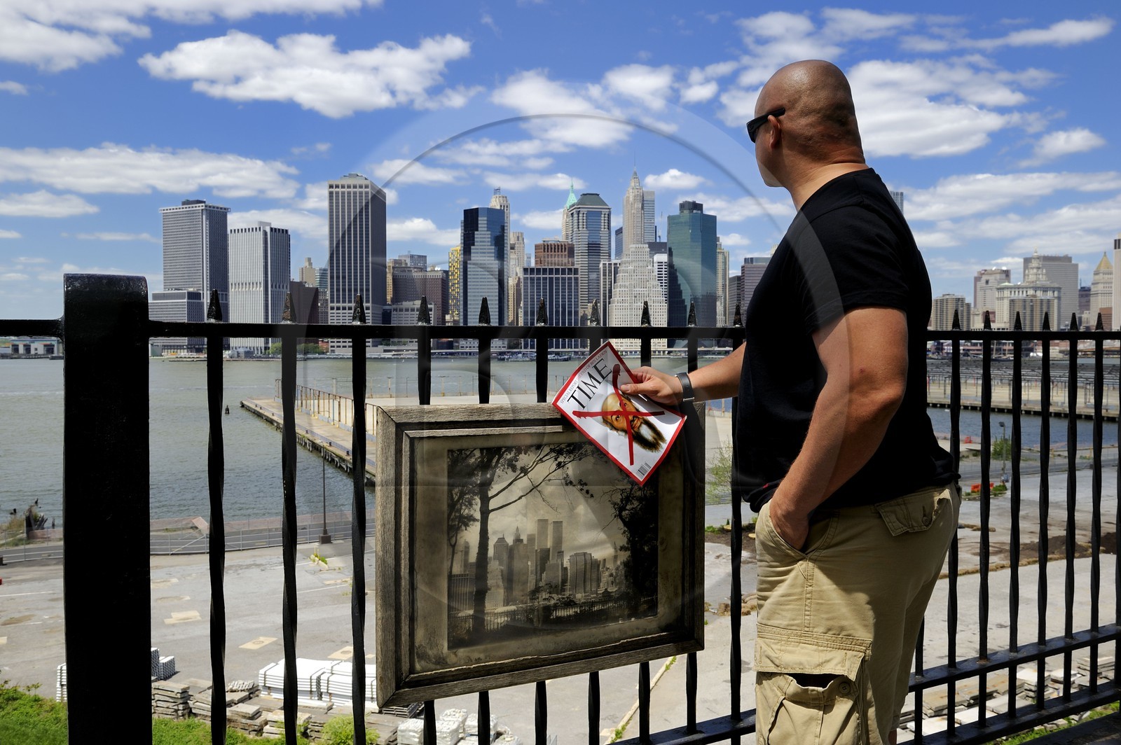 United States, New York, Downtown Manhattan seen from the Promenade in Brooklyn, the Time magazine announcing the death of Bin Laden facing the site of the attacks of September 11, 2001 on the twin towers of the World Trade Center