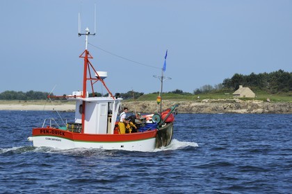 France, Finistere, Benodet, Trez Cove, exit of the Odet river estuary, return of a fishing boat