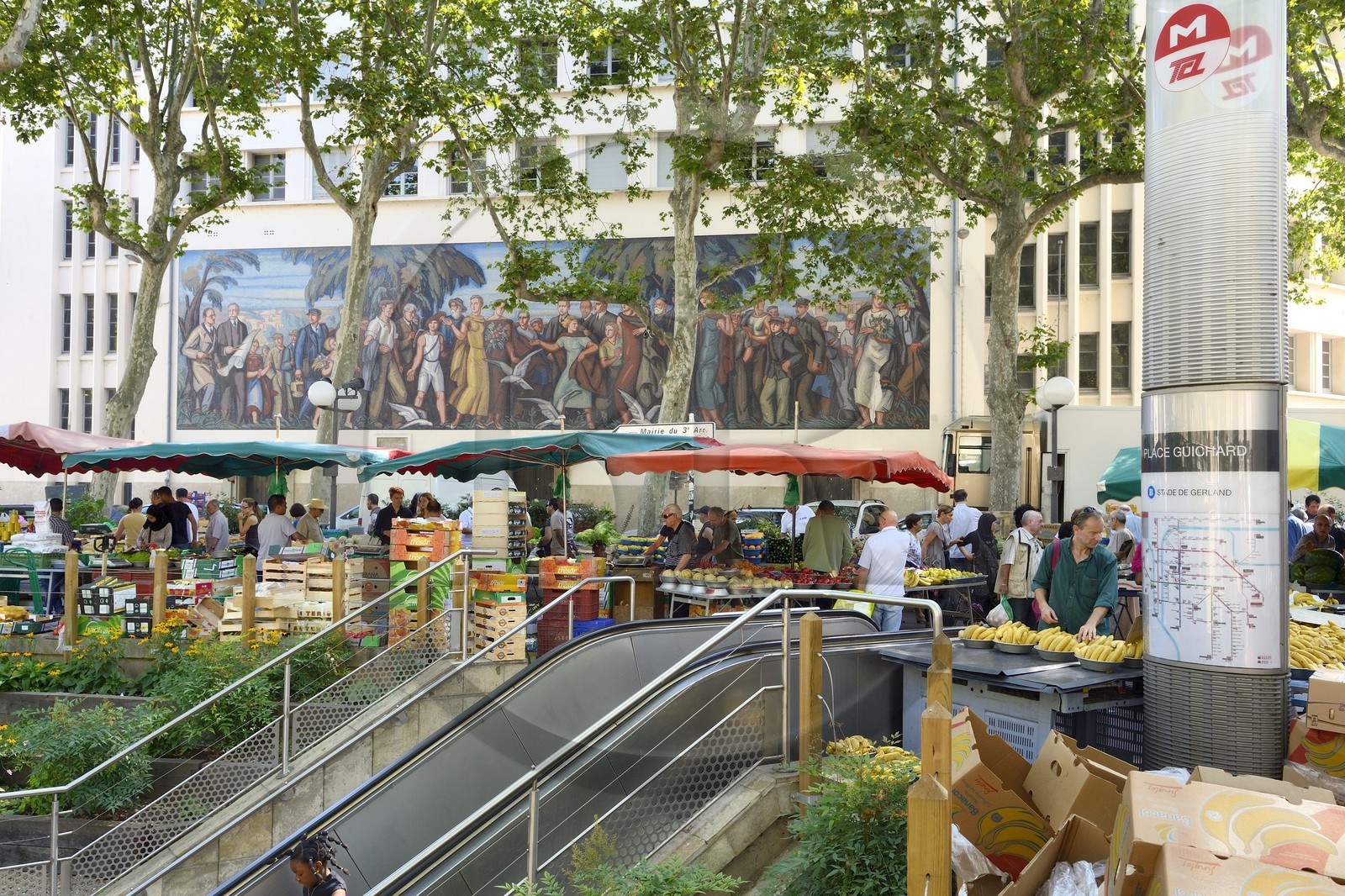 France, Rhone, Lyon, fresco on the west facade of the Bourse du Travail (Labour Exchange) on place Guichard, market day