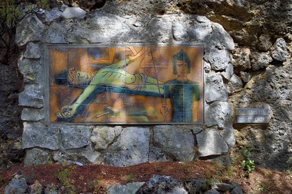 France, Var, Dracenie, Ampus, Stations of the Cross on the site of the old fortified castle created by the abbot Adonis Volpato with the ceramist Geoff Hindry, station XI Jesus is put on the Cross
