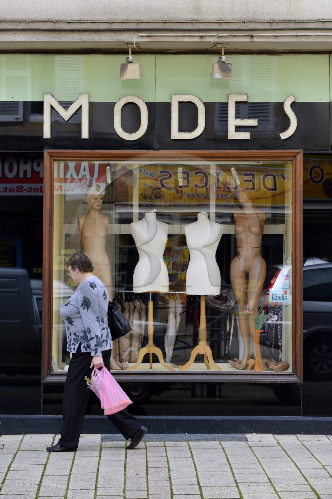 France, Moselle, Fensch Valley, Hayange, clothing store in the main street