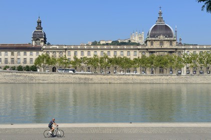 France, Rhone, Lyon, the banks of the Rhone river, the quay Victor Augagneur in the foreground, the hospital of Hotel Dieu and the Notre Dame de Fourviere Basilica, historical site listed as World Heritage by UNESCO, in the background