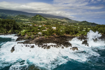 France, Reunion island (French overseas department), Saint-Joseph, the small port of the Marine de Langevin in a natural corridor of basalt rock from an old lava flow which allowed the installation of a landing stage (aerial view)