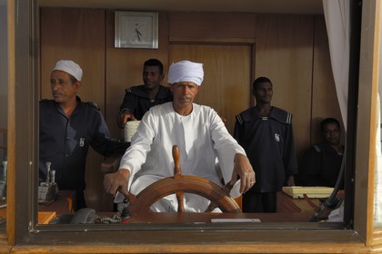 Egypt, Upper Egypt, Nubia, Lake Nasser, lake cruise on Qasr Ibrim ship, the cockpit and the captain