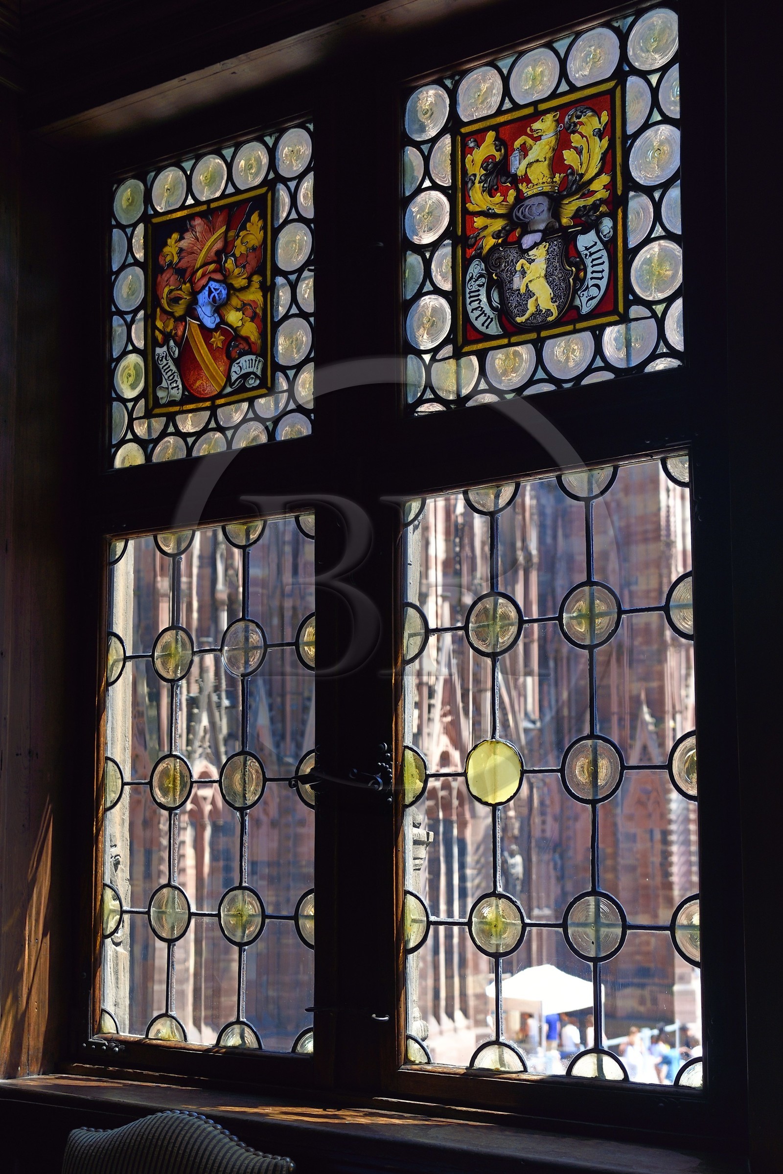 France, Bas Rhin, Strasbourg, old town listed as World Heritage by UNESCO, place de la cathedrale, the Kammerzell House from the 15th-16th century, crown glass (window)