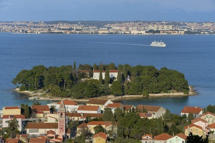 Croatia, Dalmatia, Dalmatian Coast, Ugljan Island, Preko, Franciscan Monastery on the Galovac island, Zadar in the background