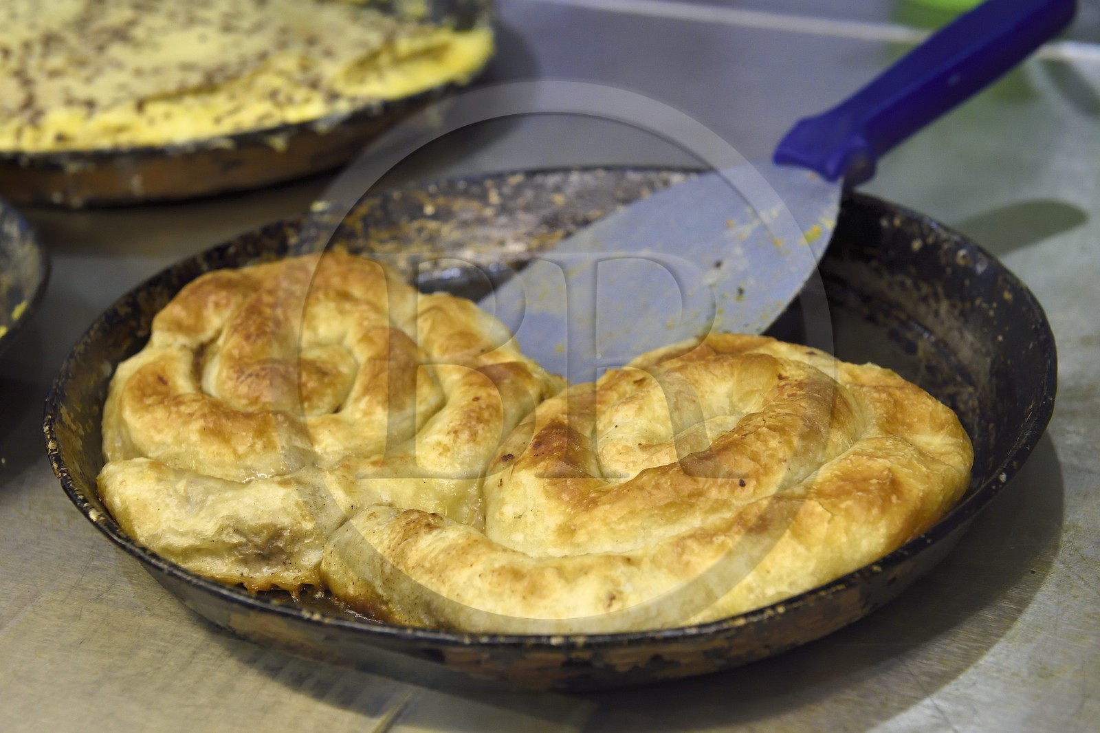 Bosnia and Herzegovina, Sarajevo, Bascarsija district in the old town, Buregdzinica Oklagija in Bravadziluk street, burek and pita restaurant, salted pastries originating from Central Asia very popular in the countries of the former Ottoman Empire, burek