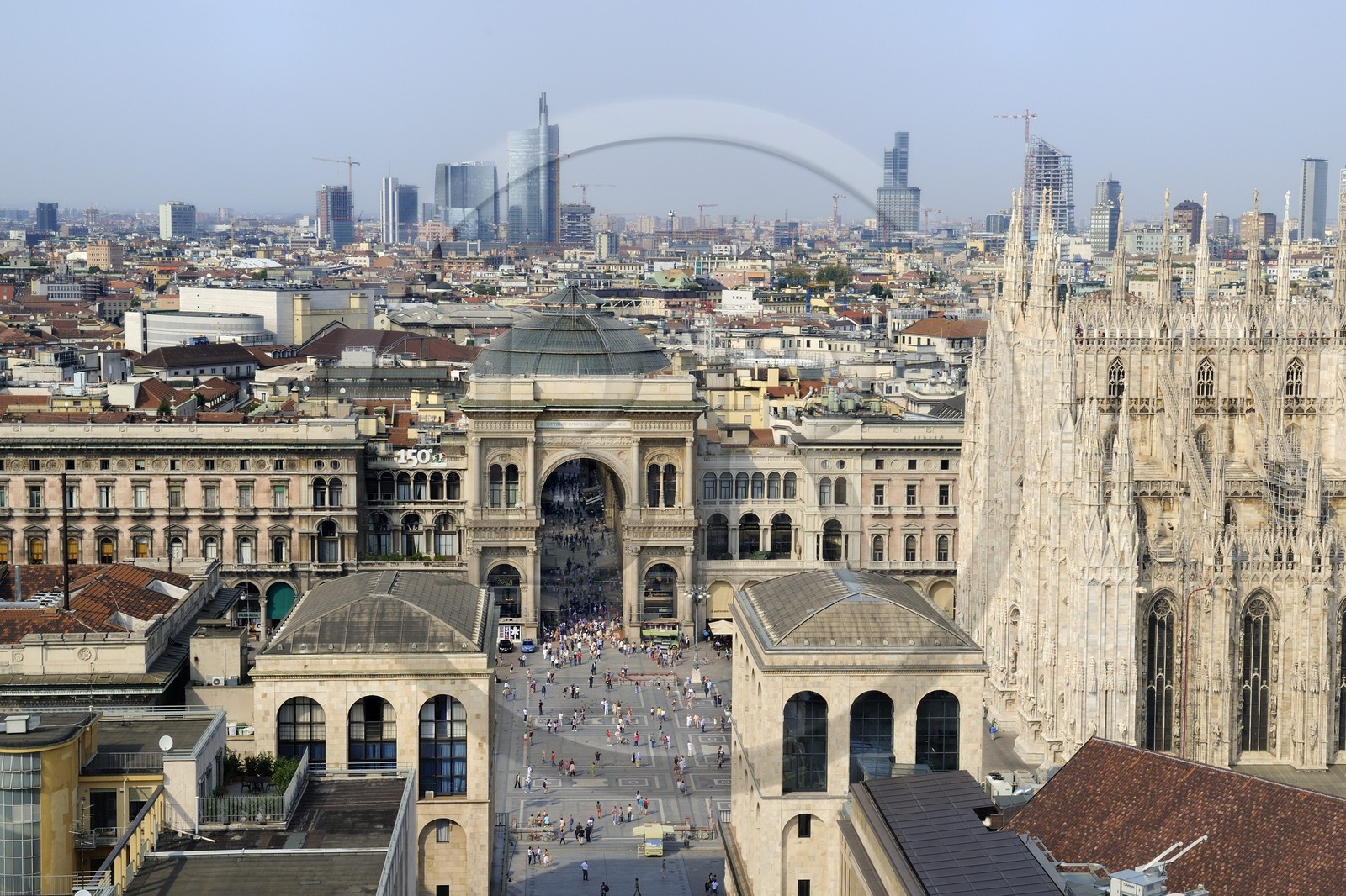 Italy, Lombardy, Milan, Piazza del Duomo and the entry of Vittorio Emmanuel II gallery, shopping arcade built on the 19th century by Giuseppe Mengoni and the Duomo