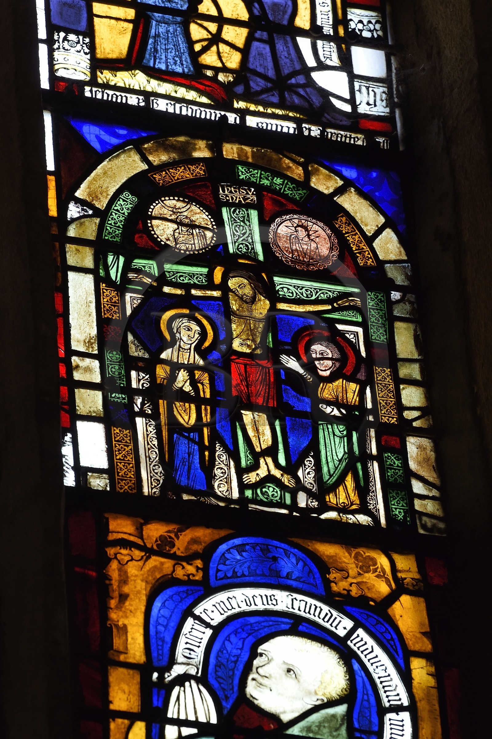 France, Moselle, Metz, Sainte-Ségolène church on the colline Sainte-Croix (Holy Cross hill), stained glass depicting a Christ on the cross of the 12th century