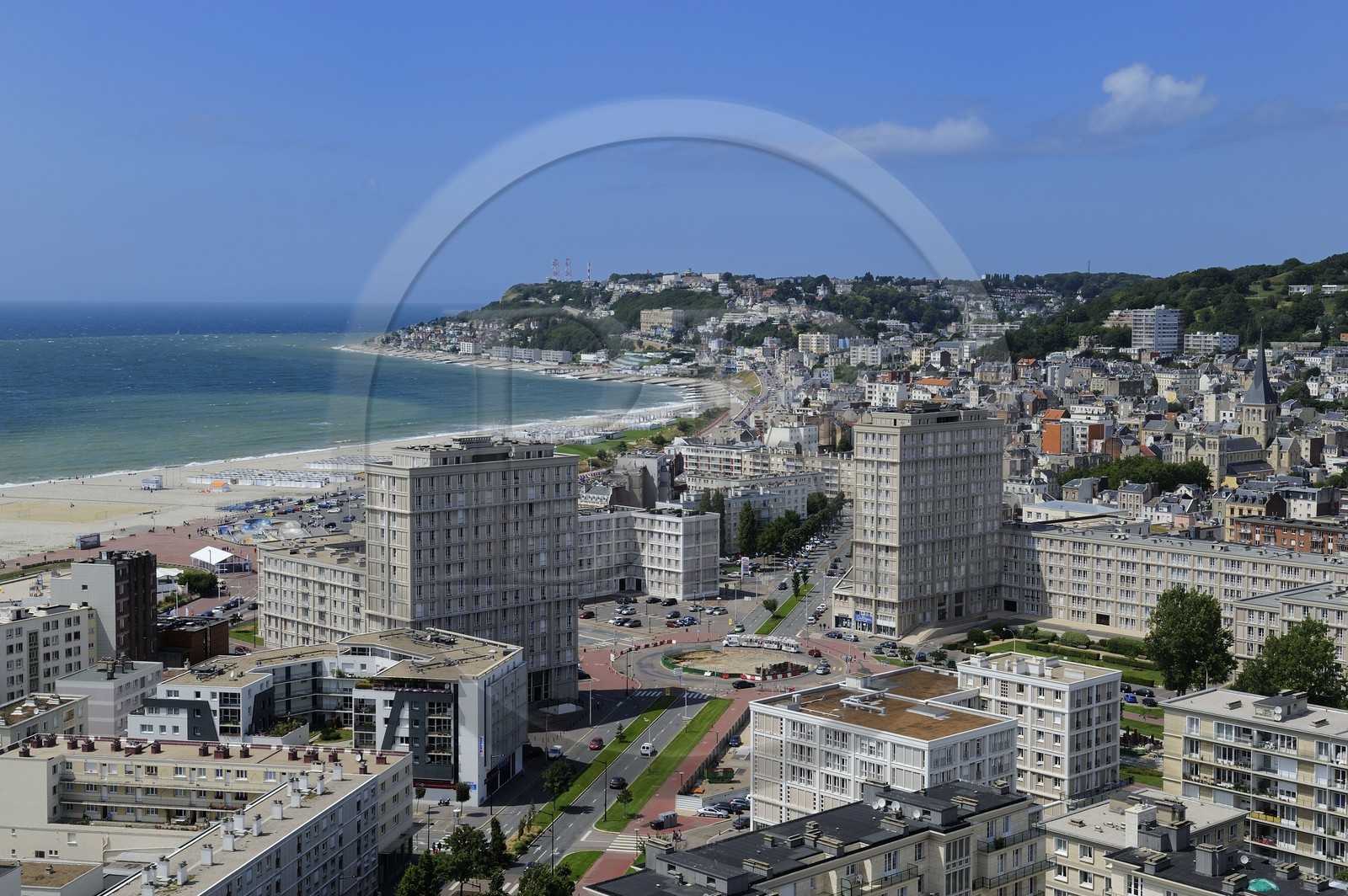 France, Seine Maritime, Le Havre, Downtown rebuilt by Auguste Perret listed as World Heritage by UNESCO, Perret buildings of Porte Océane (Ocean Gate) at the end of the Avenue Foch and Sainte-Adresse in the background