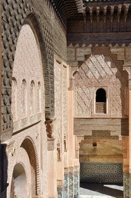 Morocco, High Atlas, Marrakech, Imperial city, Medina listed as World Heritage by UNESCO, Ali Ben Youssef Medersa (Koranic school), arched window with ornamental stucco work