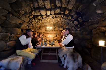 Sweden, Dalarna County, Leksand area, Midsummer celebrations in the tiny hamlet of Sunnanäng, meeting in the basement with a drink