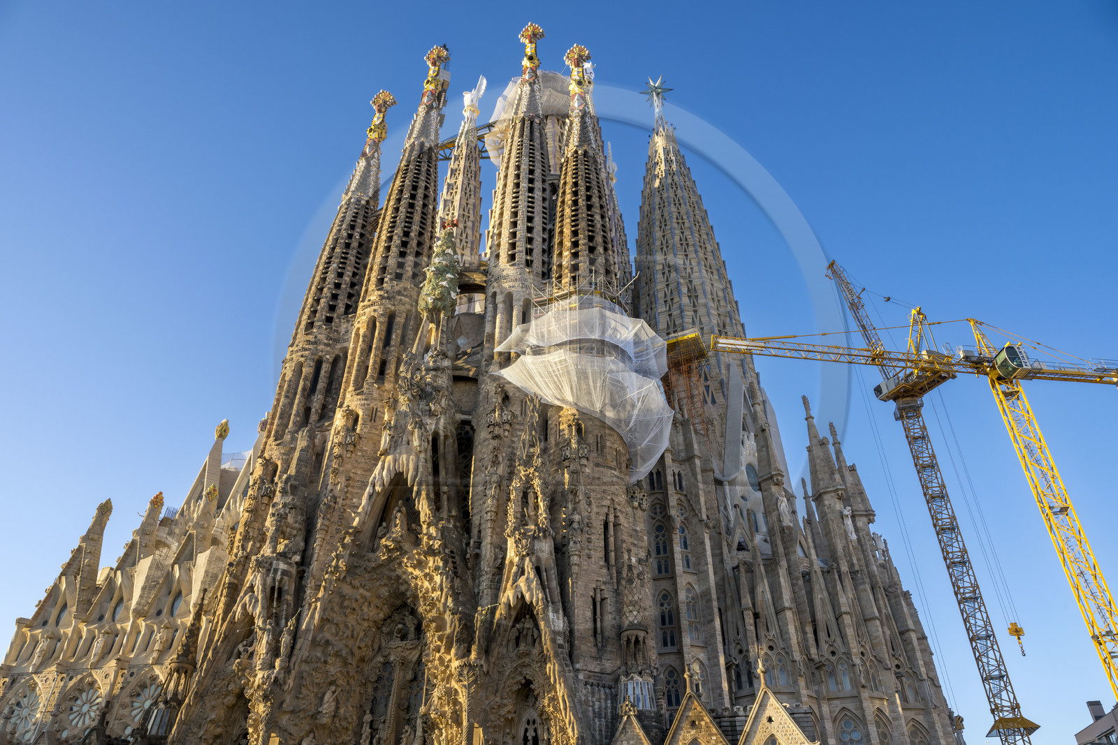 Spain, Catalonia, Barcelona, Eixample district, Sagrada Familia basilica by Catalan modernist architect Antoni Gaudi, listed as a UNESCO World Heritage Site, facade of the Nativity