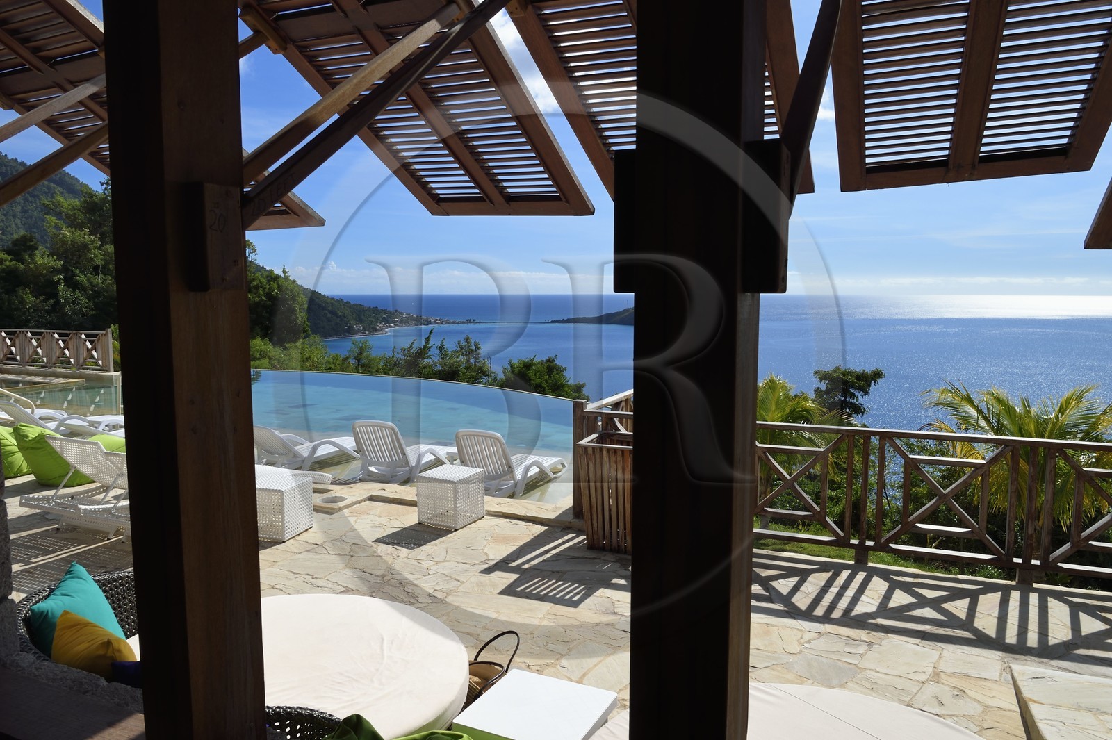 Caribbean, Dominica Island, Soufriere Bay, Soufriere, Jungle Bay hotel overflowing swimming pool