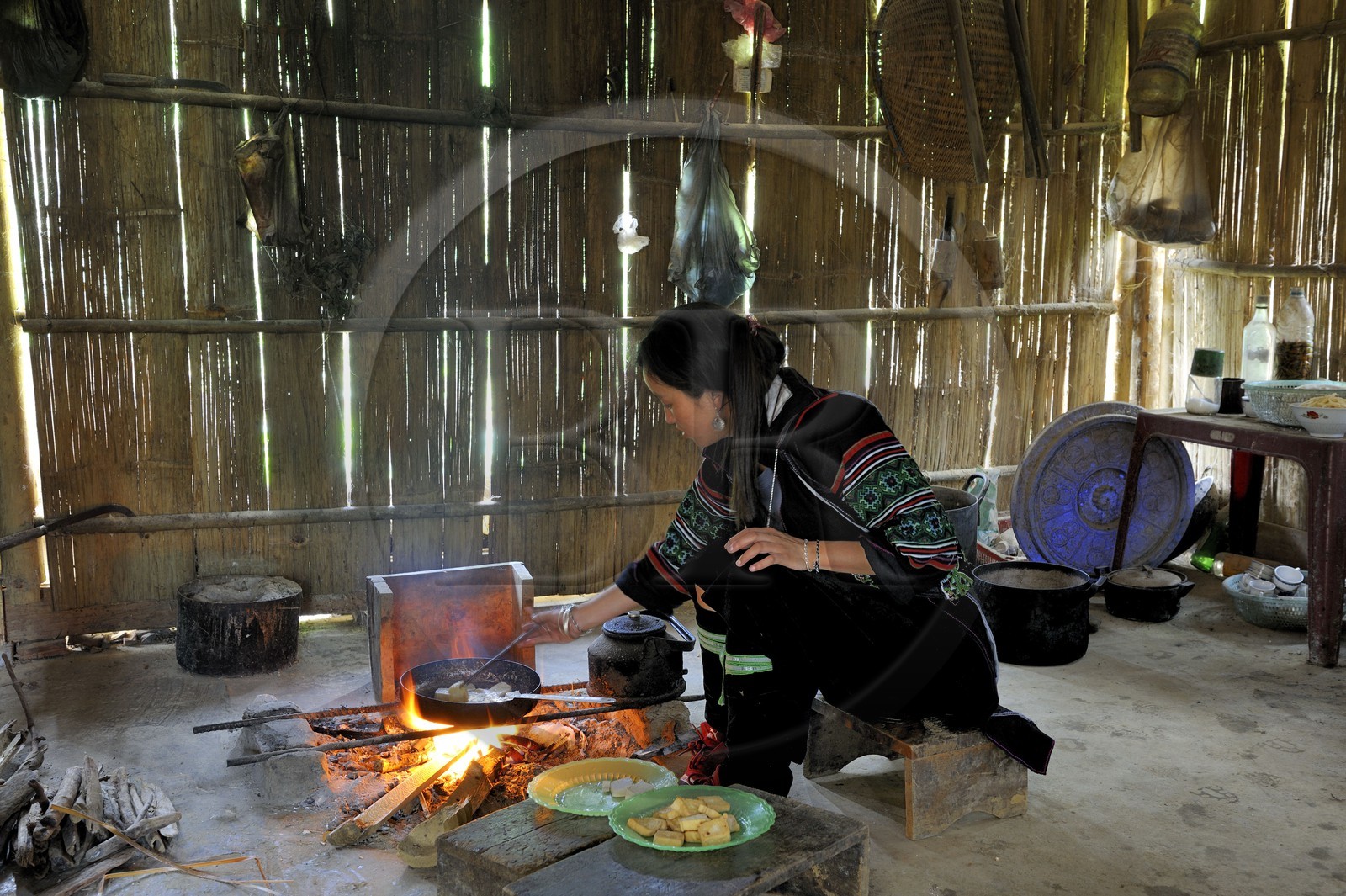 Vietnam, Lao Cai province, Sapa district, inside a house of a Black Hmong ethnic group, daily life in the kitchen cooking the Tofu