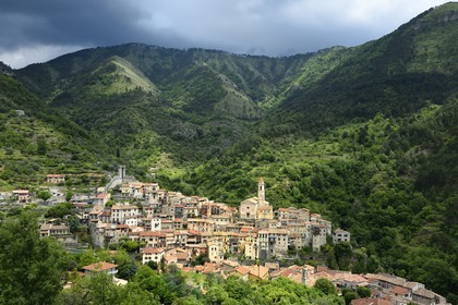 France, Alpes-Maritimes, the hilltop village of Lucéram, the 14th century tower left and St Margaret Church on the right