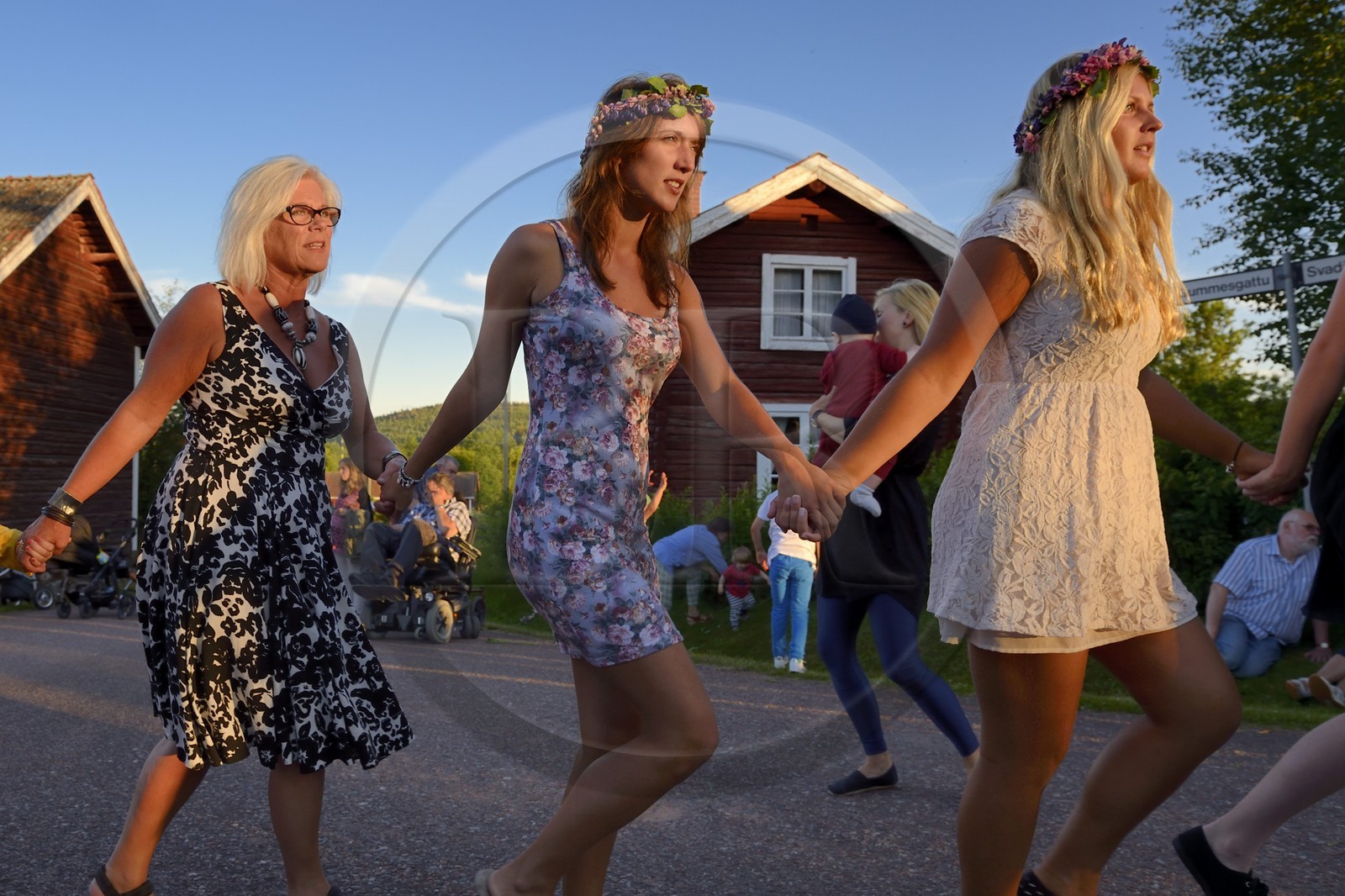 Sweden, Dalarna County, Leksand area, Midsummer celebrations in the tiny hamlet of Hjulbäck, crowns of flowers for unmarried girls