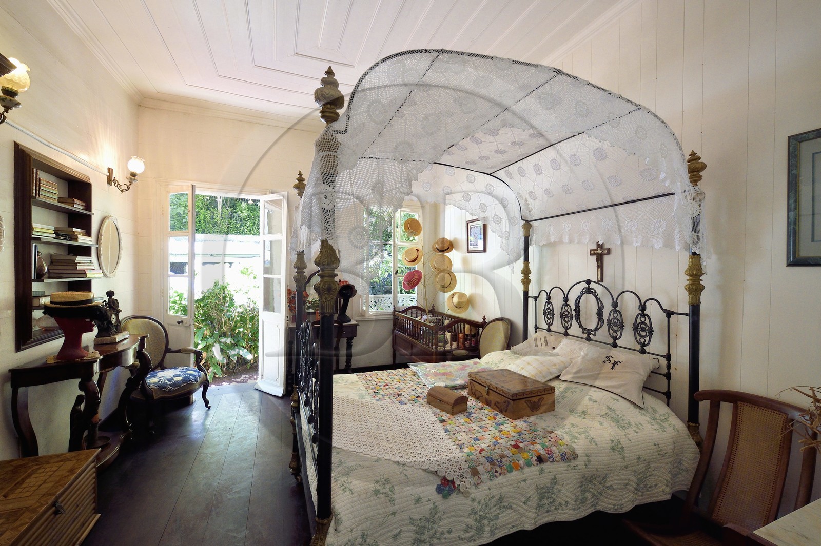 France, Reunion island (French overseas department), Cirque de Salazie, listed as World Heritage by UNESCO, Hell-Bourg, labeled labelled Les Plus Beaux Villages de France (The Most Beautiful Villages of France), the Villa or Maison Folio with the traditional Creole architecture of the 19th century, four poster bed in the bedroom