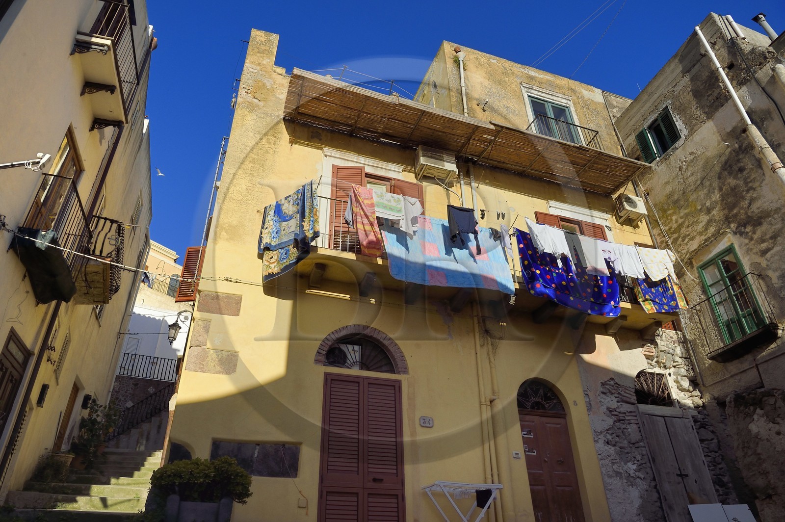 Italy, Sicily, Aeolian Islands, listed as World Heritage by UNESCO, Lipari Island, Lipari, laundry drying on the balcony of a house in the old town