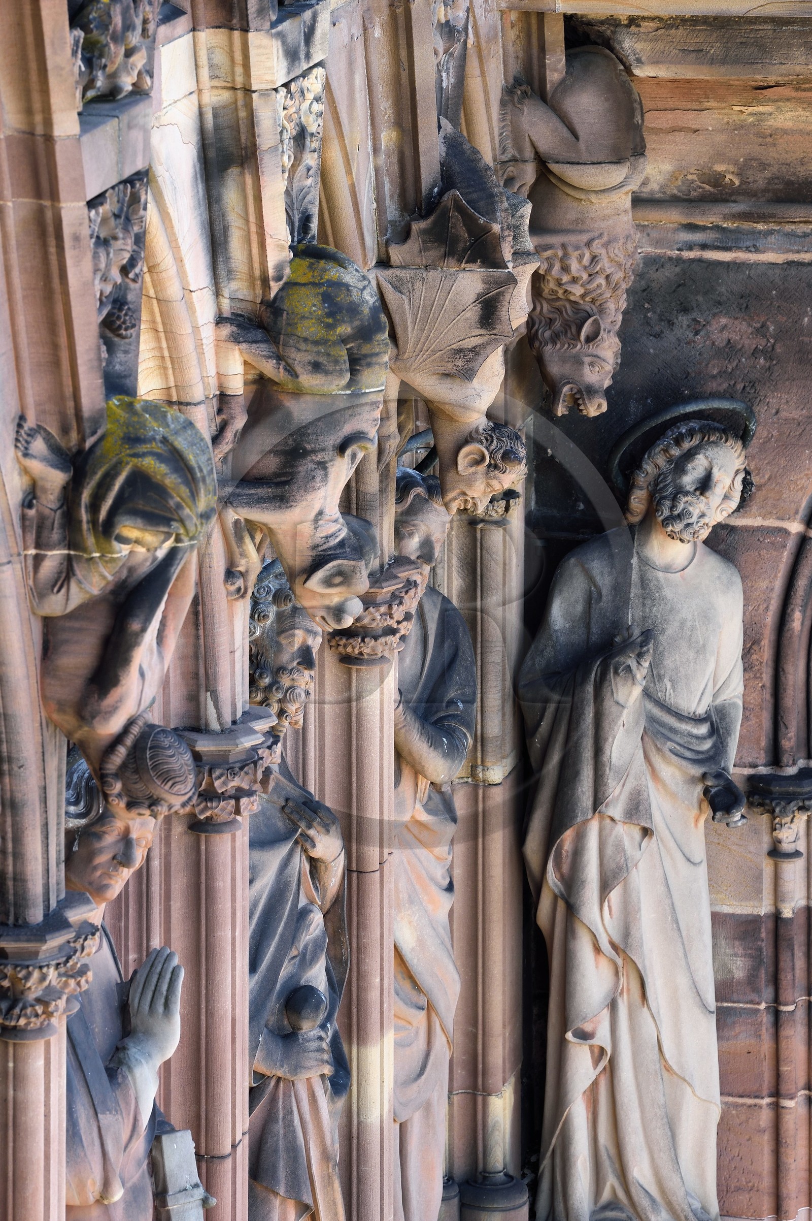France, Bas Rhin, Strasbourg, old town listed as World Heritage by UNESCO, Notre Dame Cathedral, the western facade, the gallery of the apostles, deformed and chimerical beings on the columns between the apostles