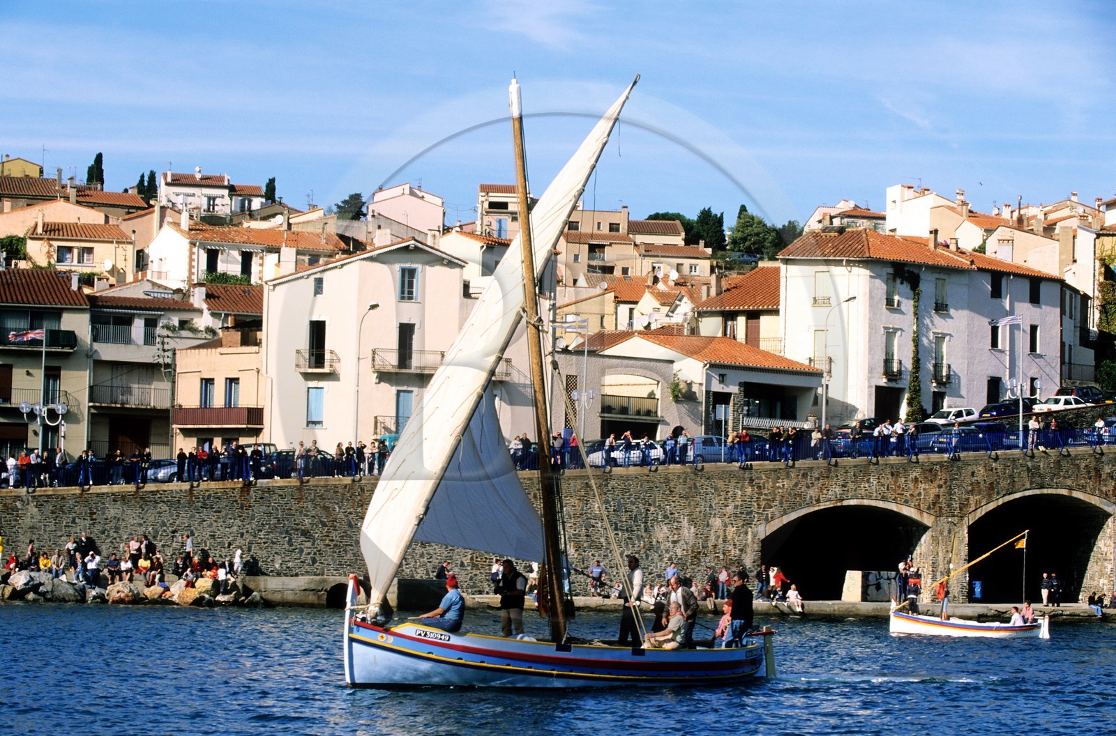 France, Pyrenees Orientales, Banyuls sur Mer, traditional Catalan fishing boat in front of the village