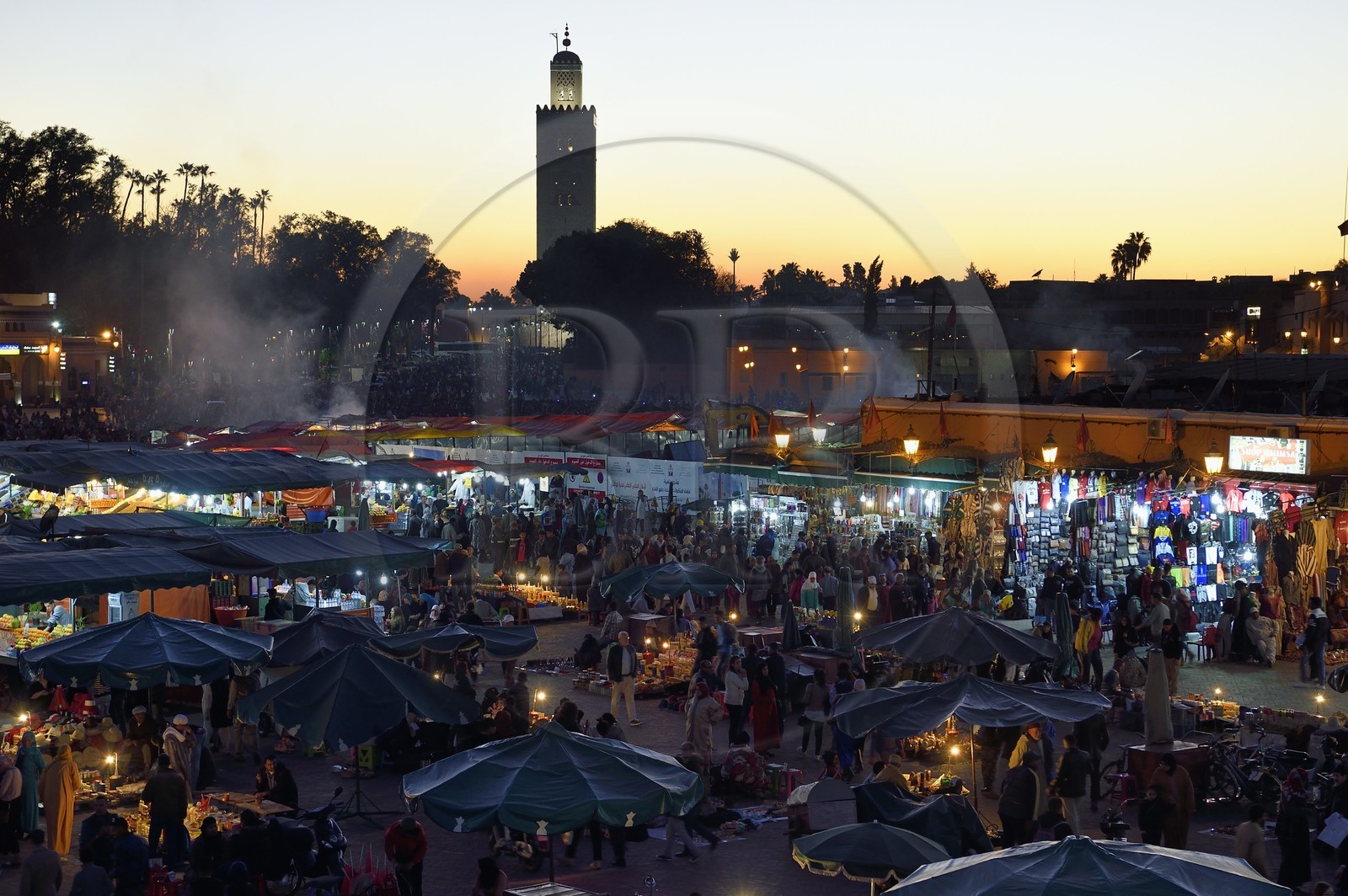 Morocco, High Atlas, Marrakech, Imperial city, Medina listed as World Heritage by UNESCO, Jemaa el-Fna square and the minaret of the Koutoubia mosque in the background