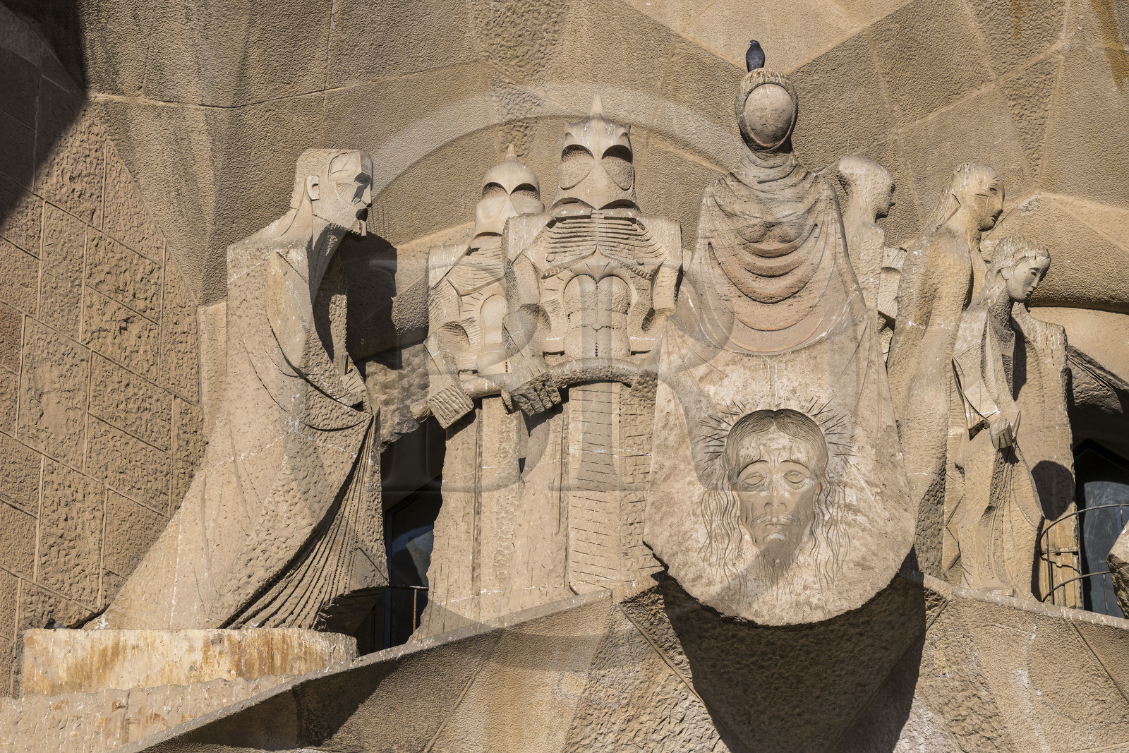 Spain, Catalonia, Barcelona, Eixample district, Sagrada Familia basilica by Catalan modernist architect Antoni Gaudi, listed as a UNESCO World Heritage Site, Gaudi (left) embodied in the figure of an evangelist by the sculptor Subirachs