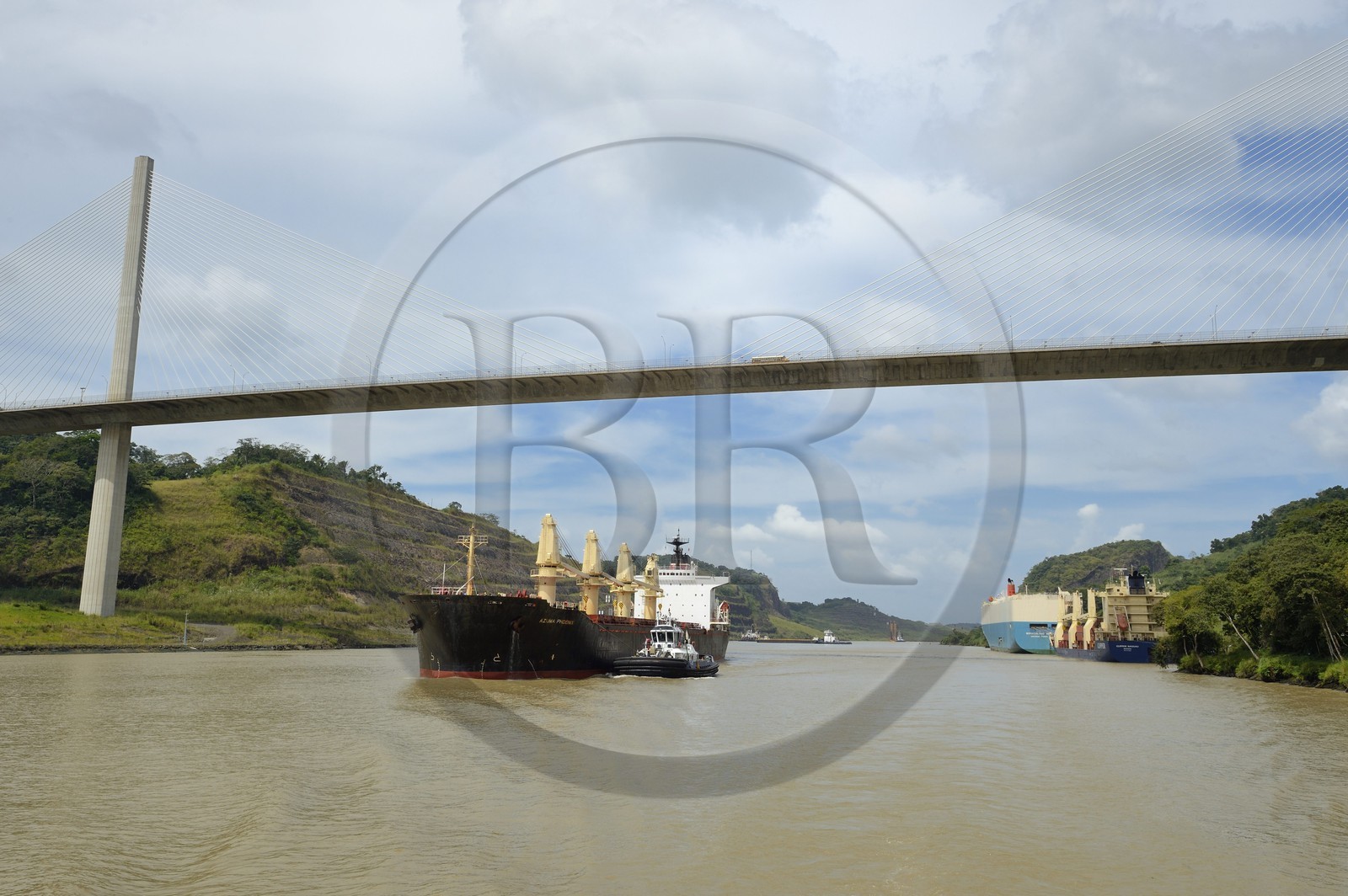 Panama, Panama Canal, Panamax cargo and the Centennal bridge (puente Centenario) spanning the Canal
