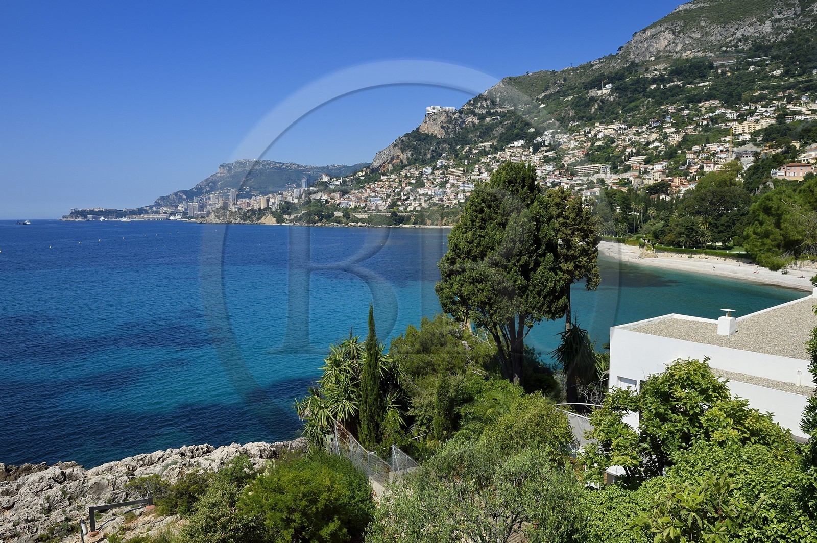 France, Alpes-Maritimes, Roquebrune-Cap-Martin, Cap Martin, coastal footpath, Promenade Le Corbusier, view from the Le Corbusier Cabanon (shed) and the Principality of Monaco in the background