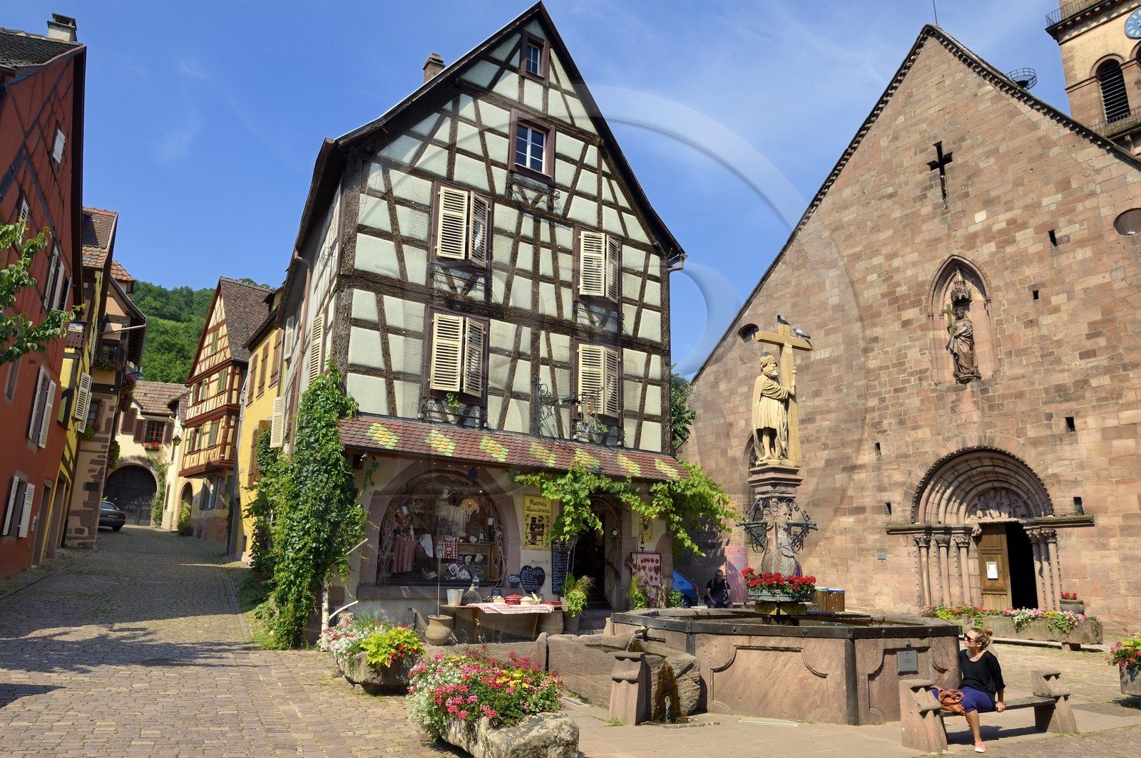 France, Haut Rhin, Kaysersberg, Saint Constantin's statue on the Old Market square and the Sainte Croix church
