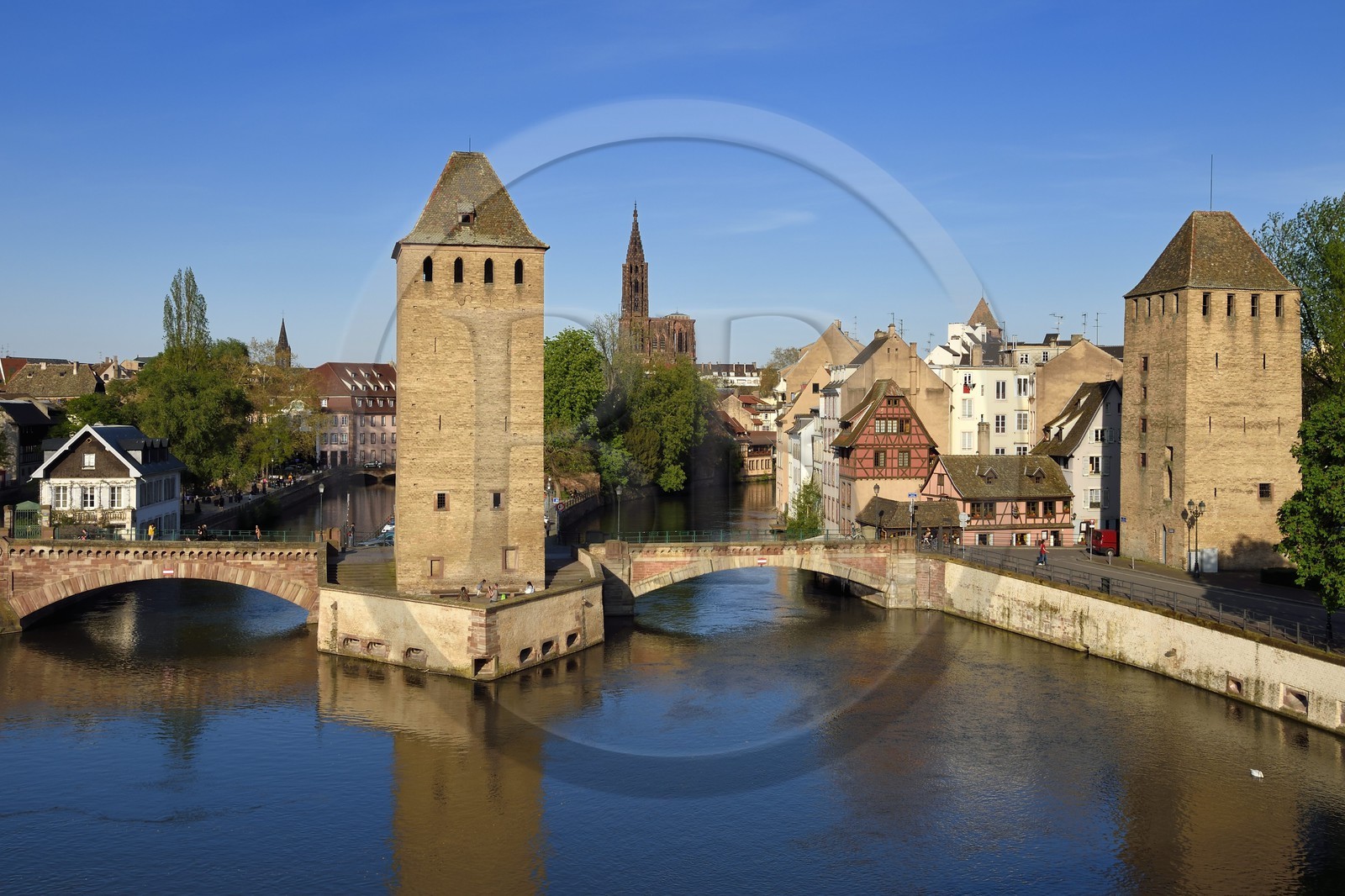 France, Bas Rhin, Strasbourg, old town listed as World Heritage by UNESCO, Petite France District, defensive towers of the covered bridges and Notre Dame Cathedral in the background