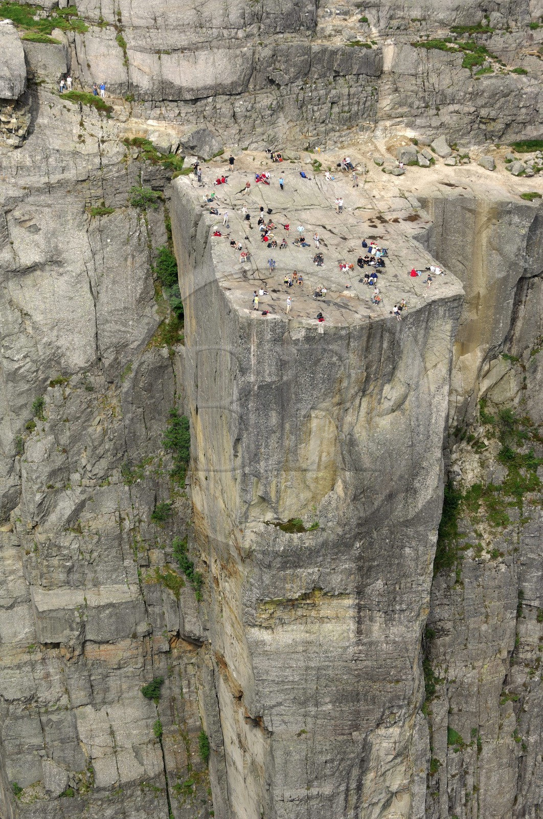 Norway, Rogaland, hikers on the Pulpit Rock (Preikestolen)  in the Lysefjord - fjord of Lysebotn (aerial view)