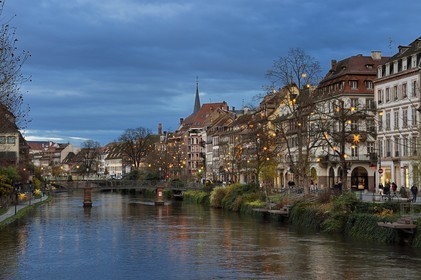 France, Bas Rhin, Strasbourg, old town listed as World Heritage by UNESCO, banks of Ill River with Christmas lights, the quai des Bateliers turned into a meeting place for pedestrians